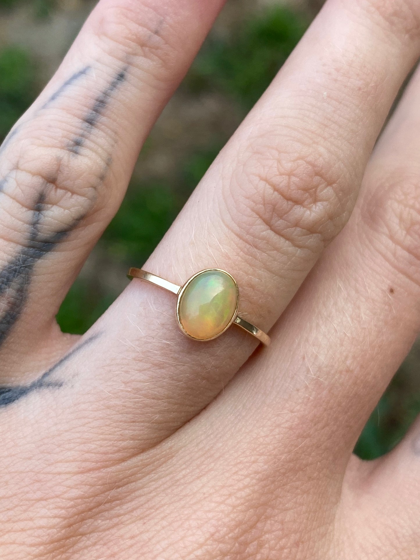 14kt .80ctw opal bezel ring