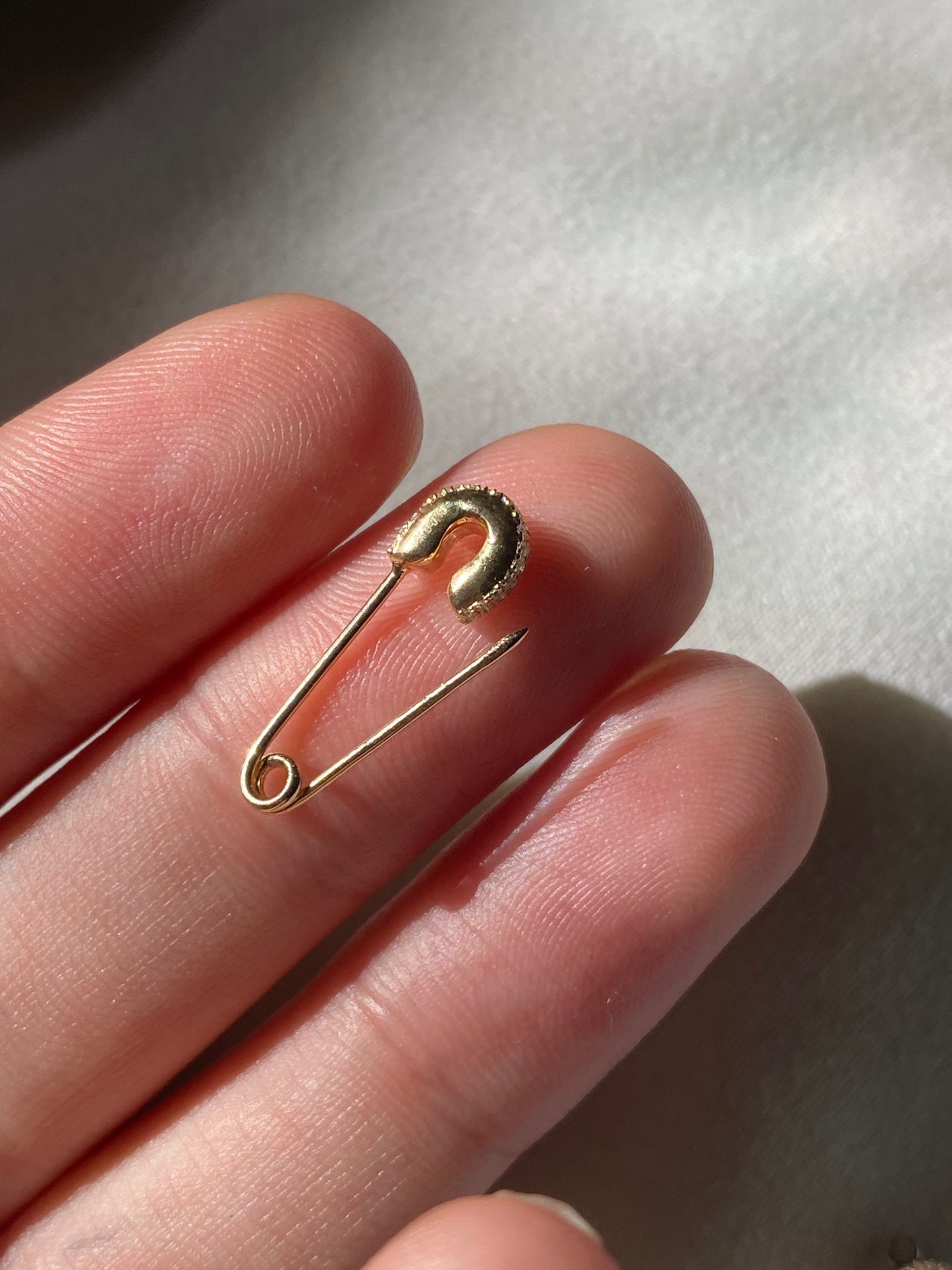 14kt diamond safety pin, functional