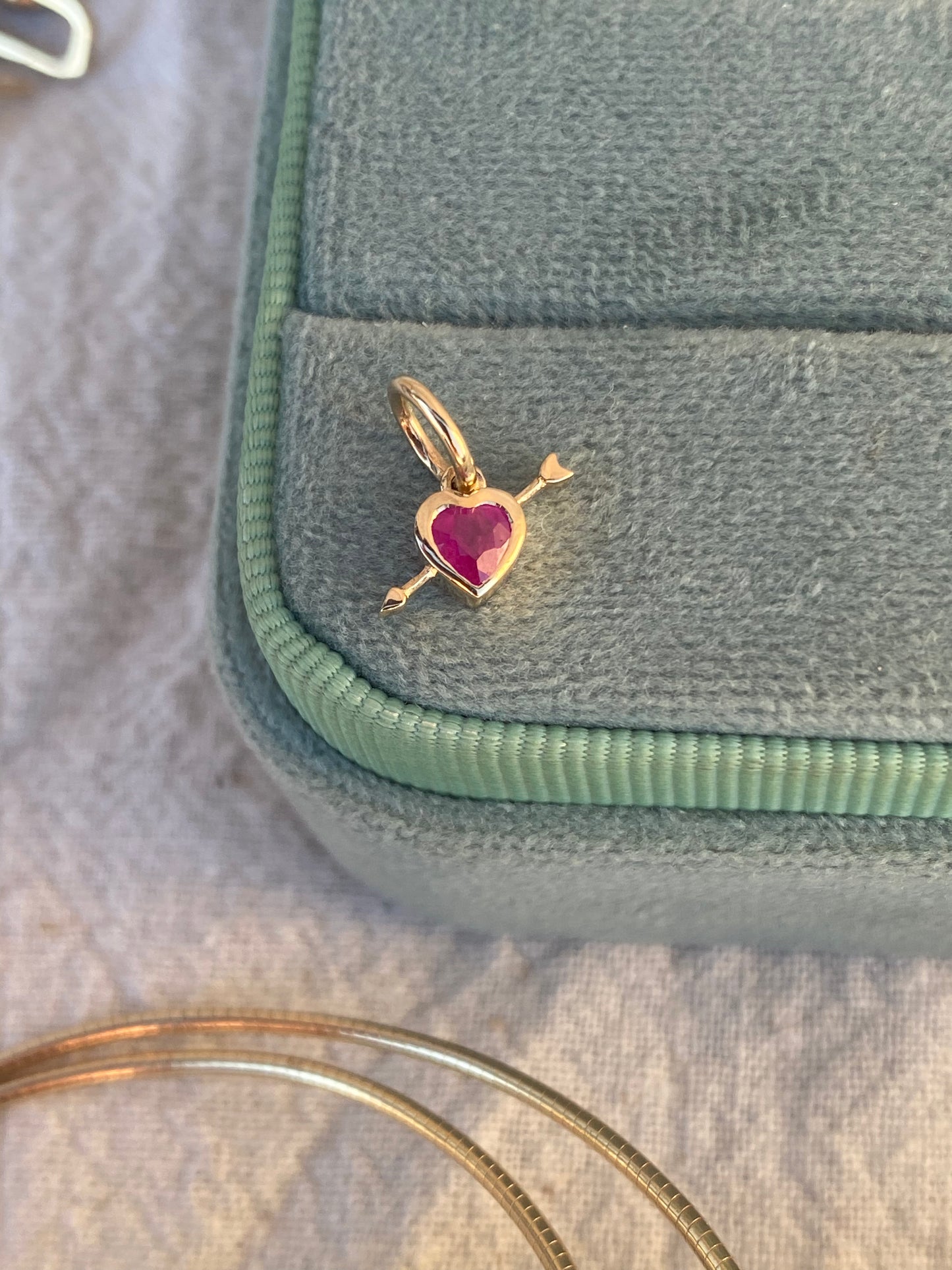 14kt bezel ruby heart arrow