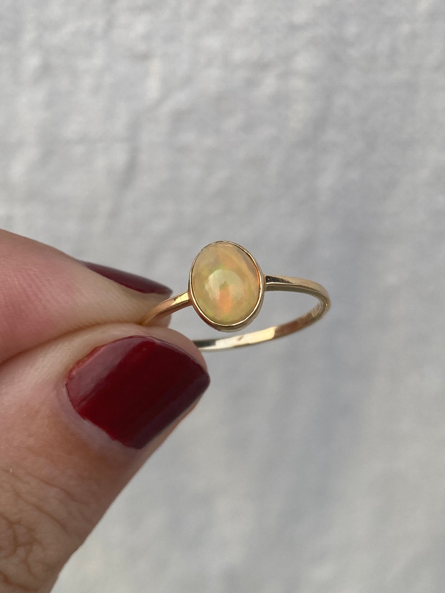 14kt .80ctw opal bezel ring