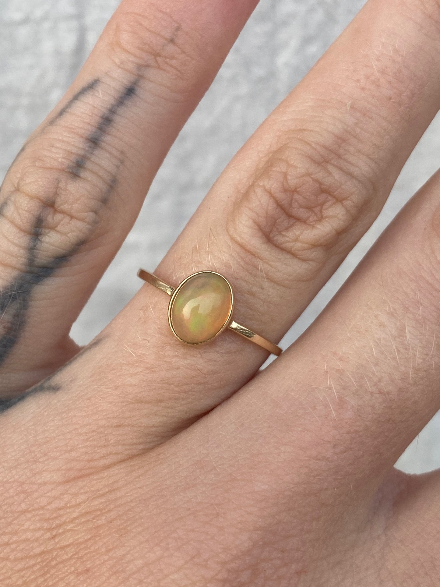 14kt .80ctw opal bezel ring