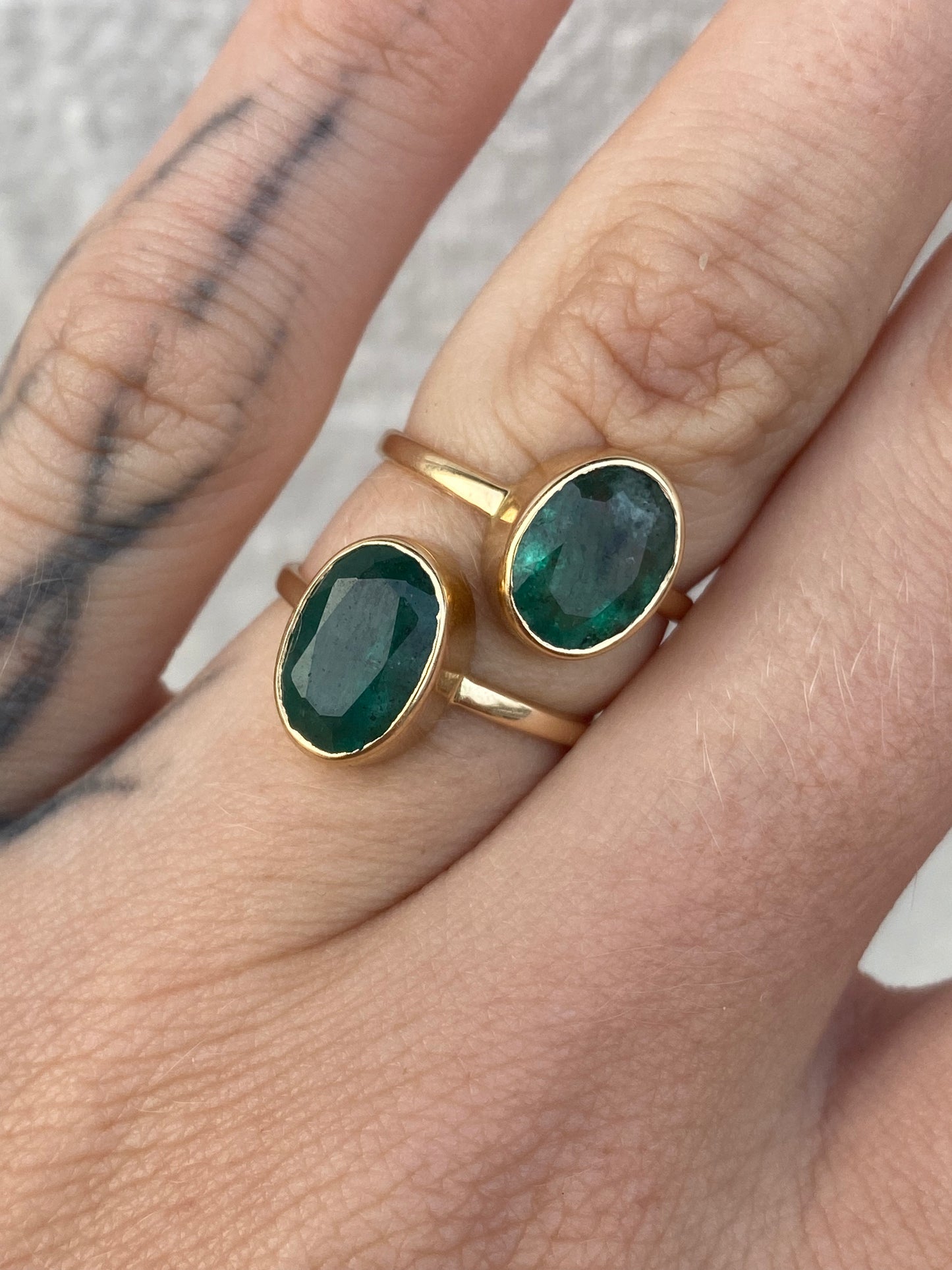 14kt bezeled emerald ring