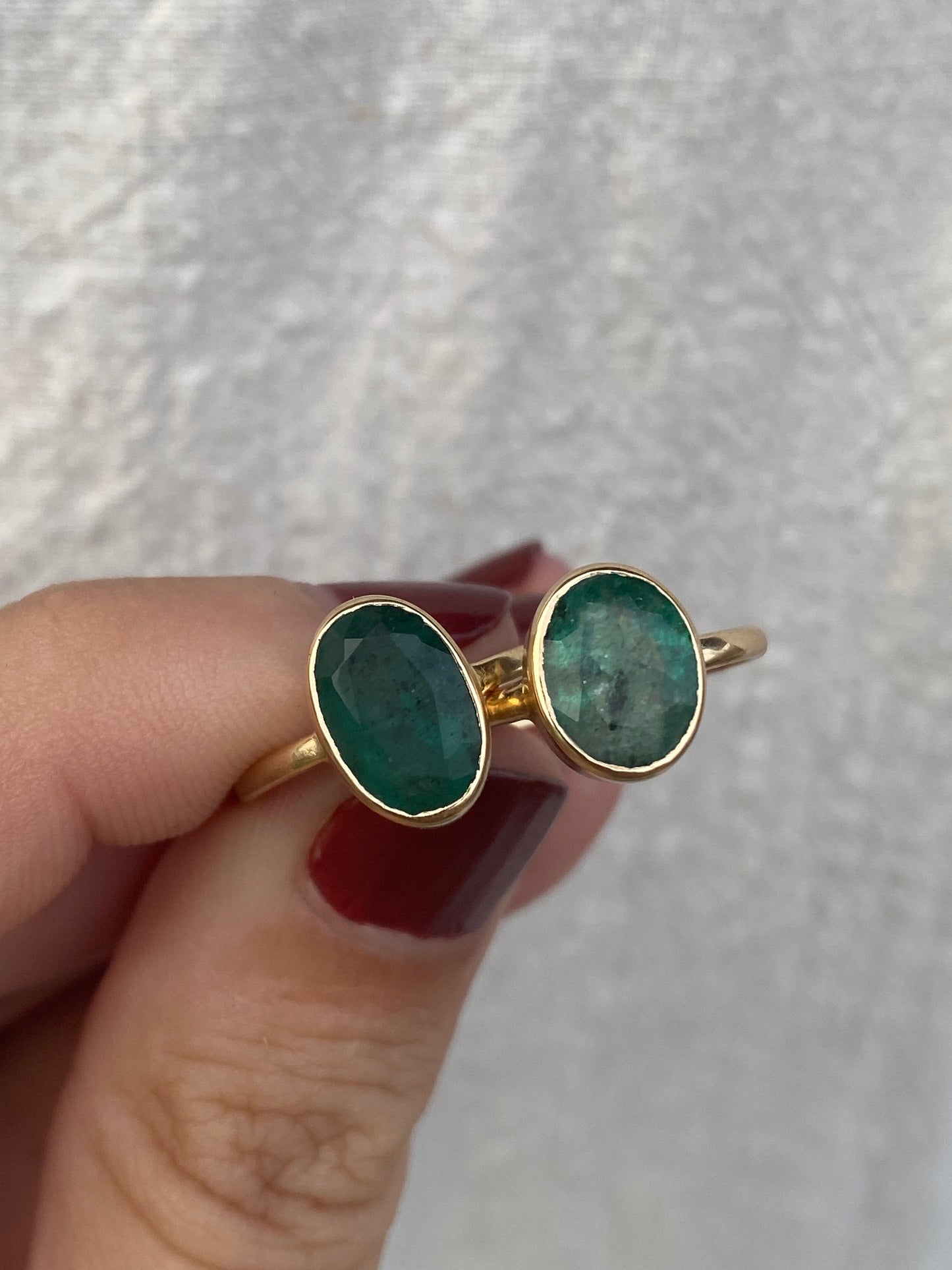 14kt bezeled emerald ring