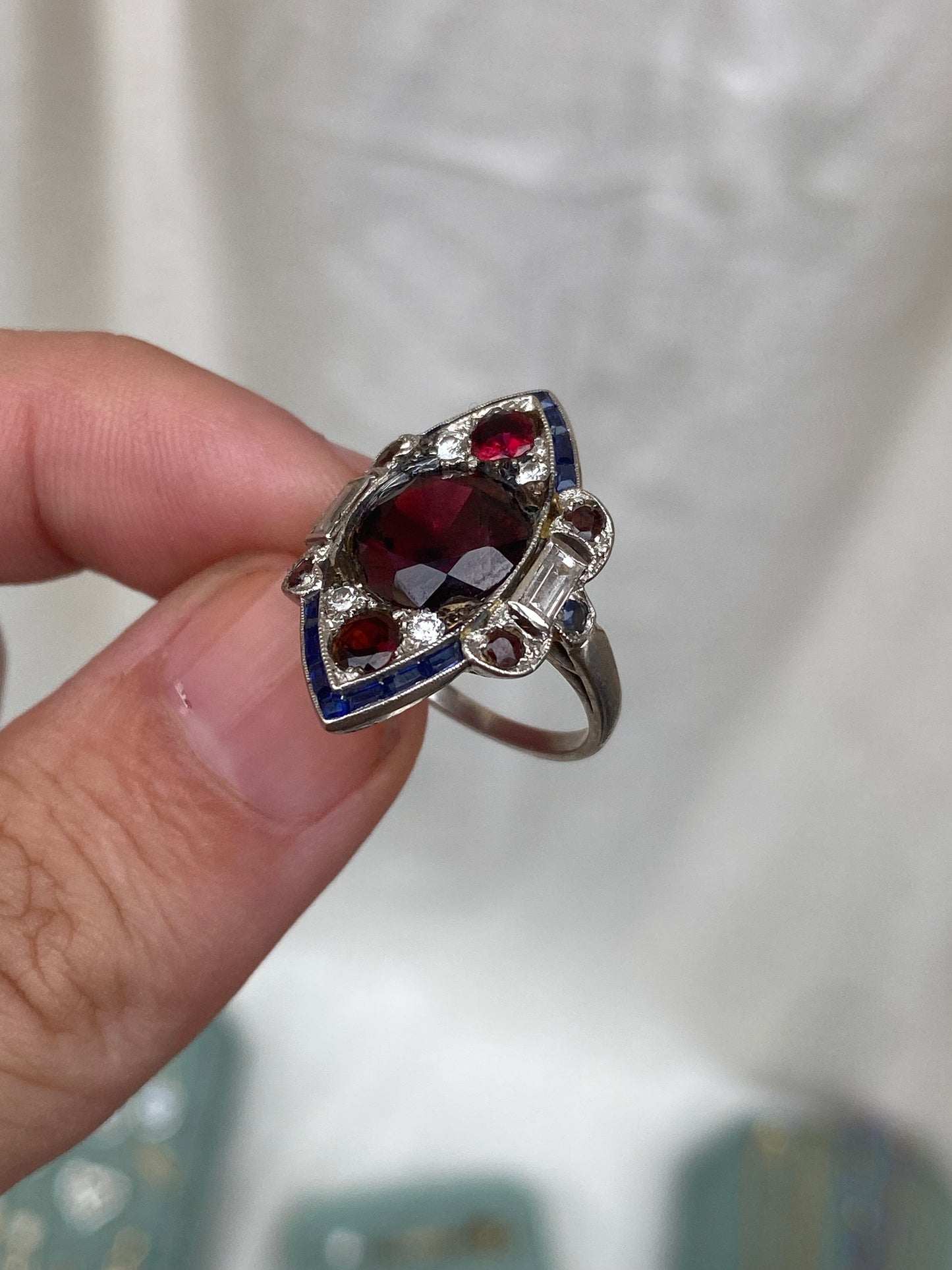 art deco platinum ring with garnet sapphire diamonds