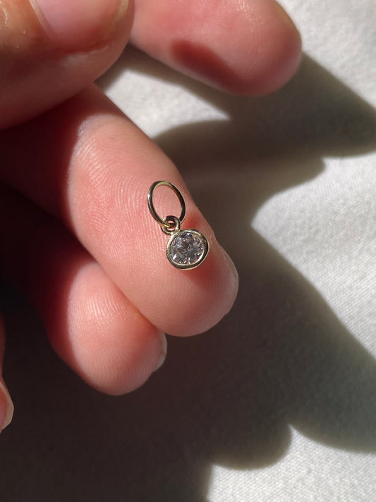 14kt .15ctw bezel diamond pendant