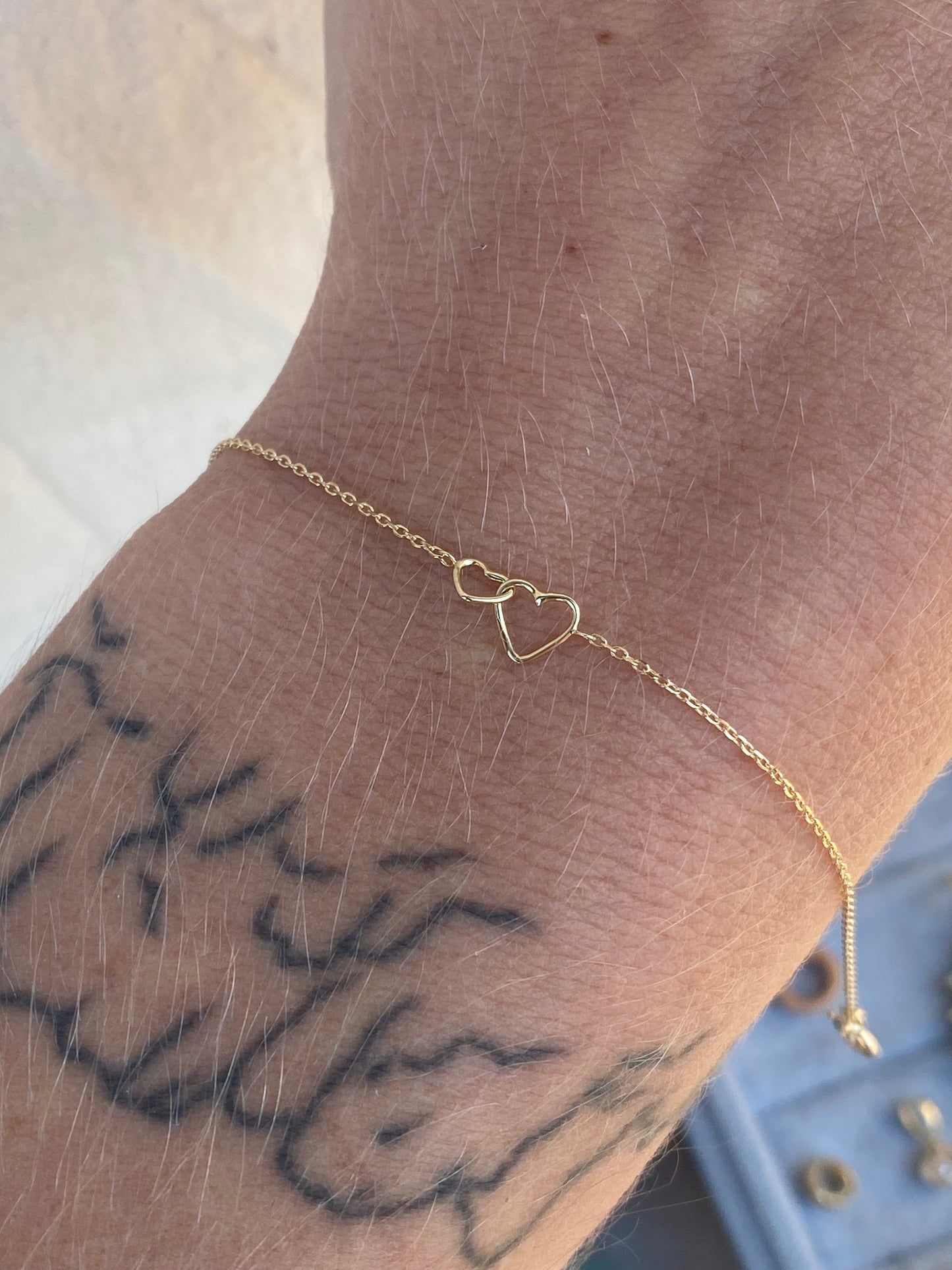 14kt 7" adjustable dual heart bracelet