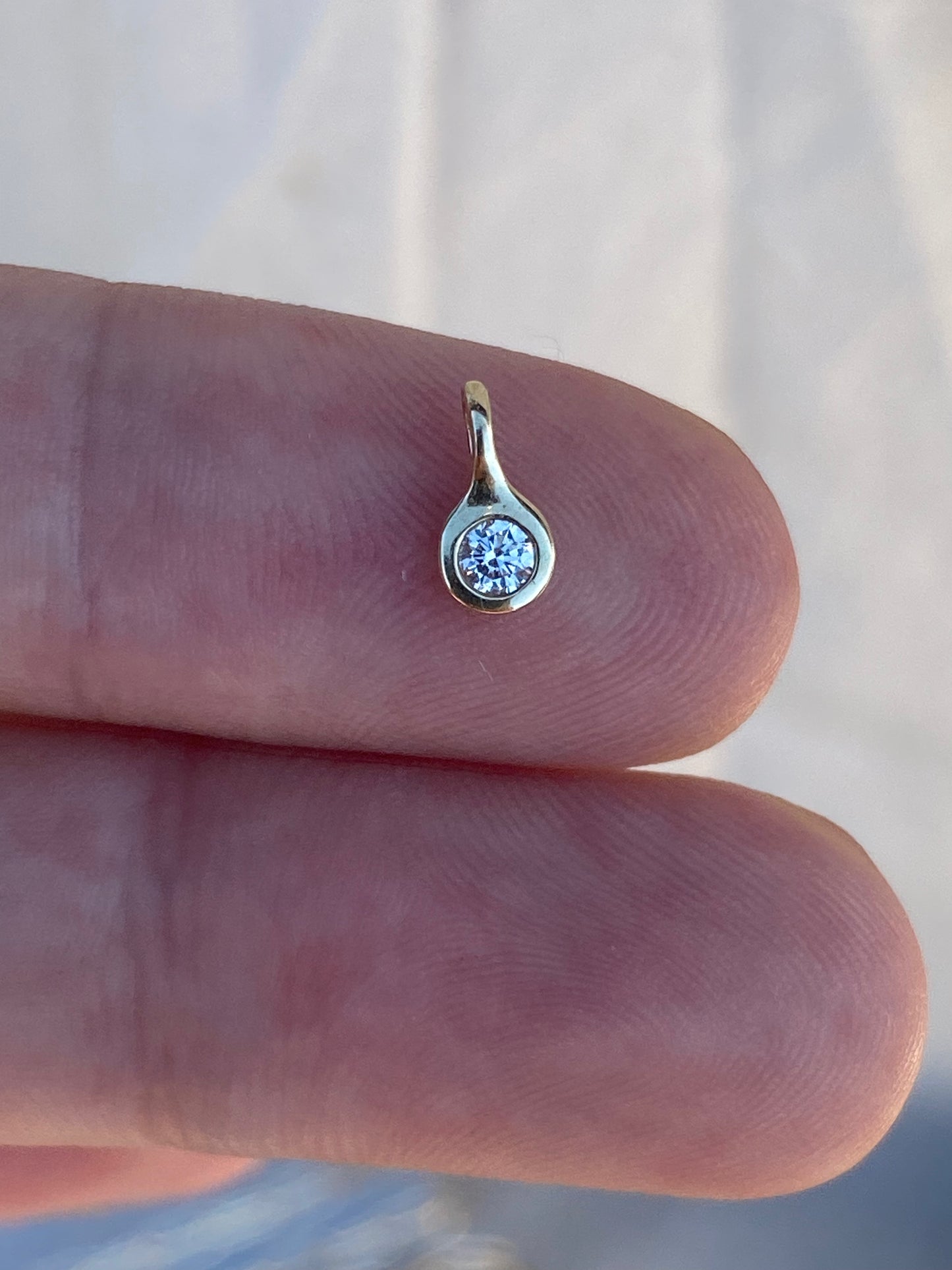 14kt mini diamond pendant