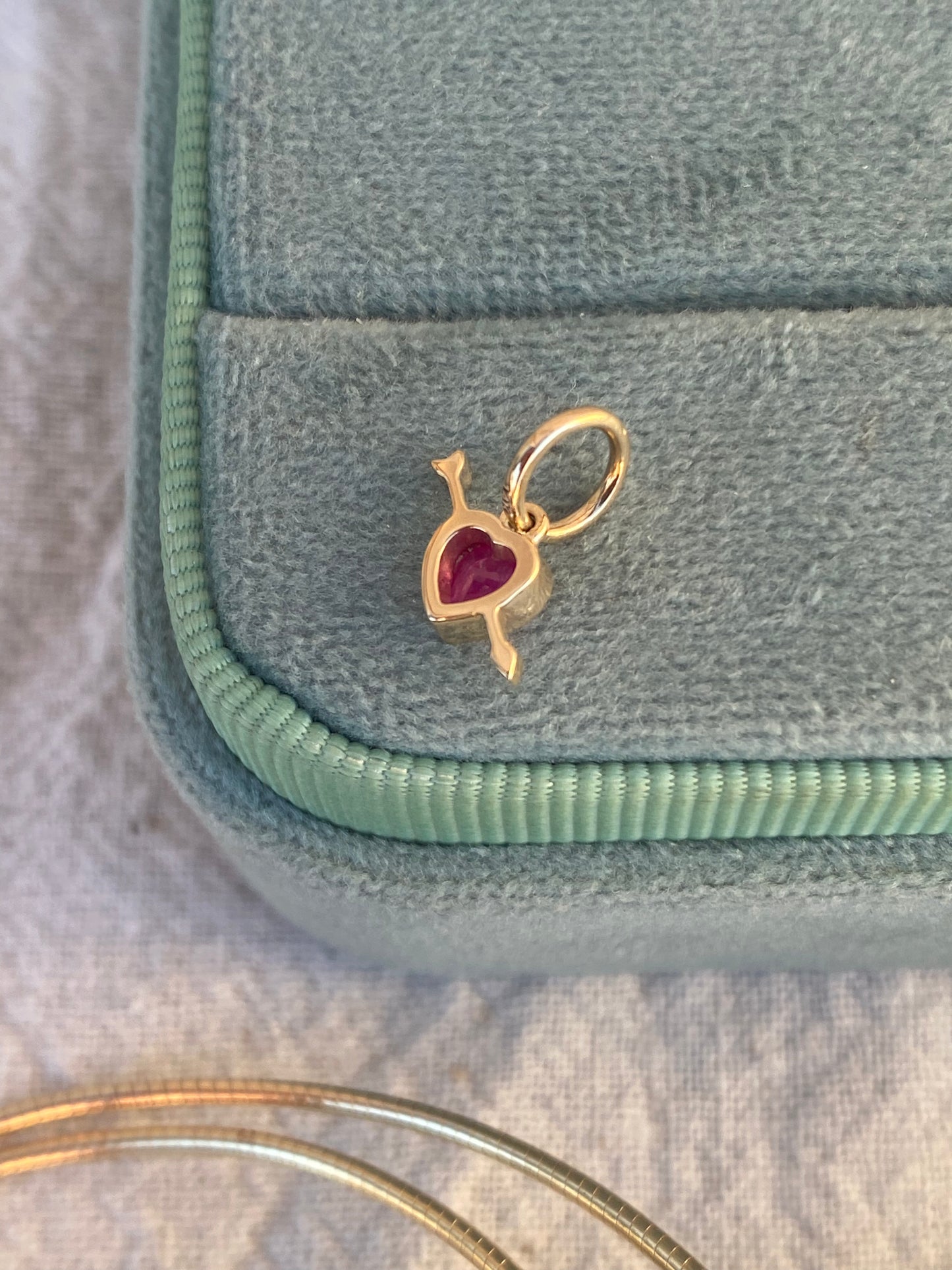 14kt bezel ruby heart arrow