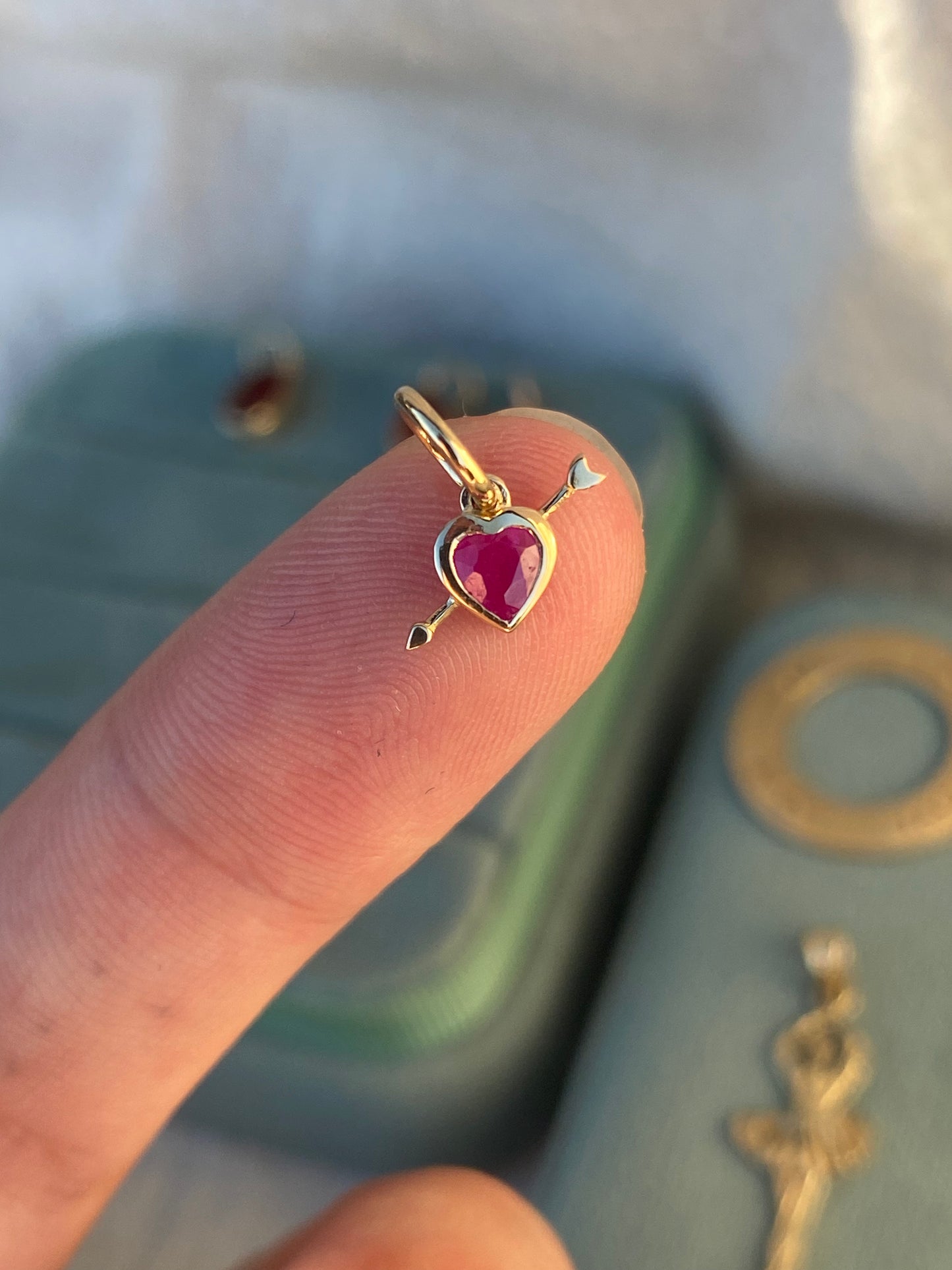 14kt bezel ruby heart arrow