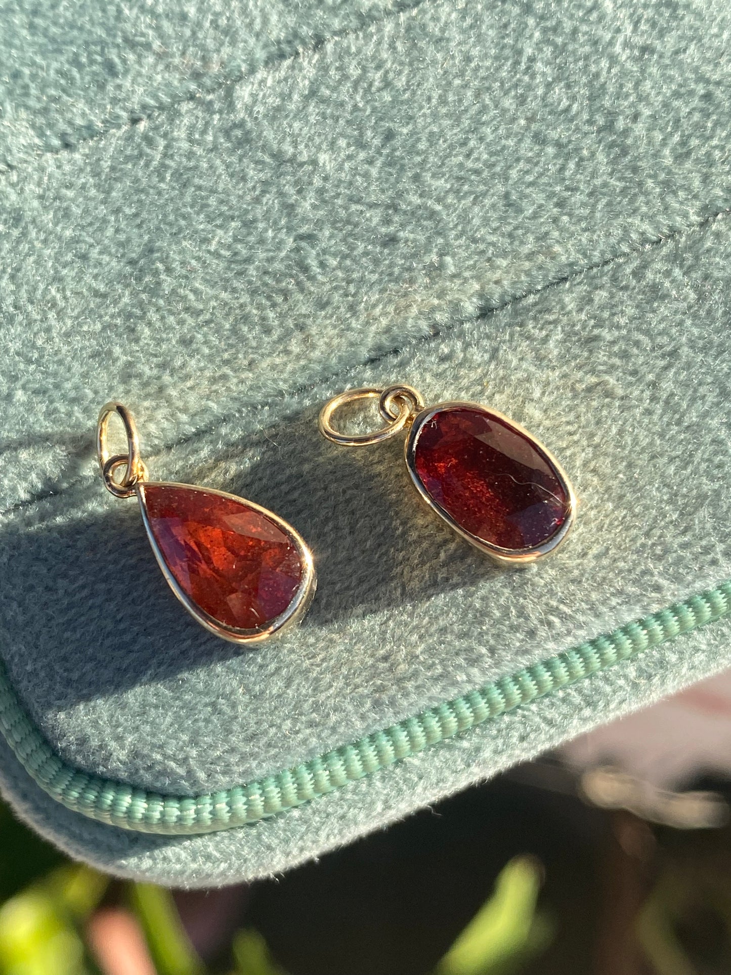 14kt 2.88ctw red/orange sapphire bezel pendant
