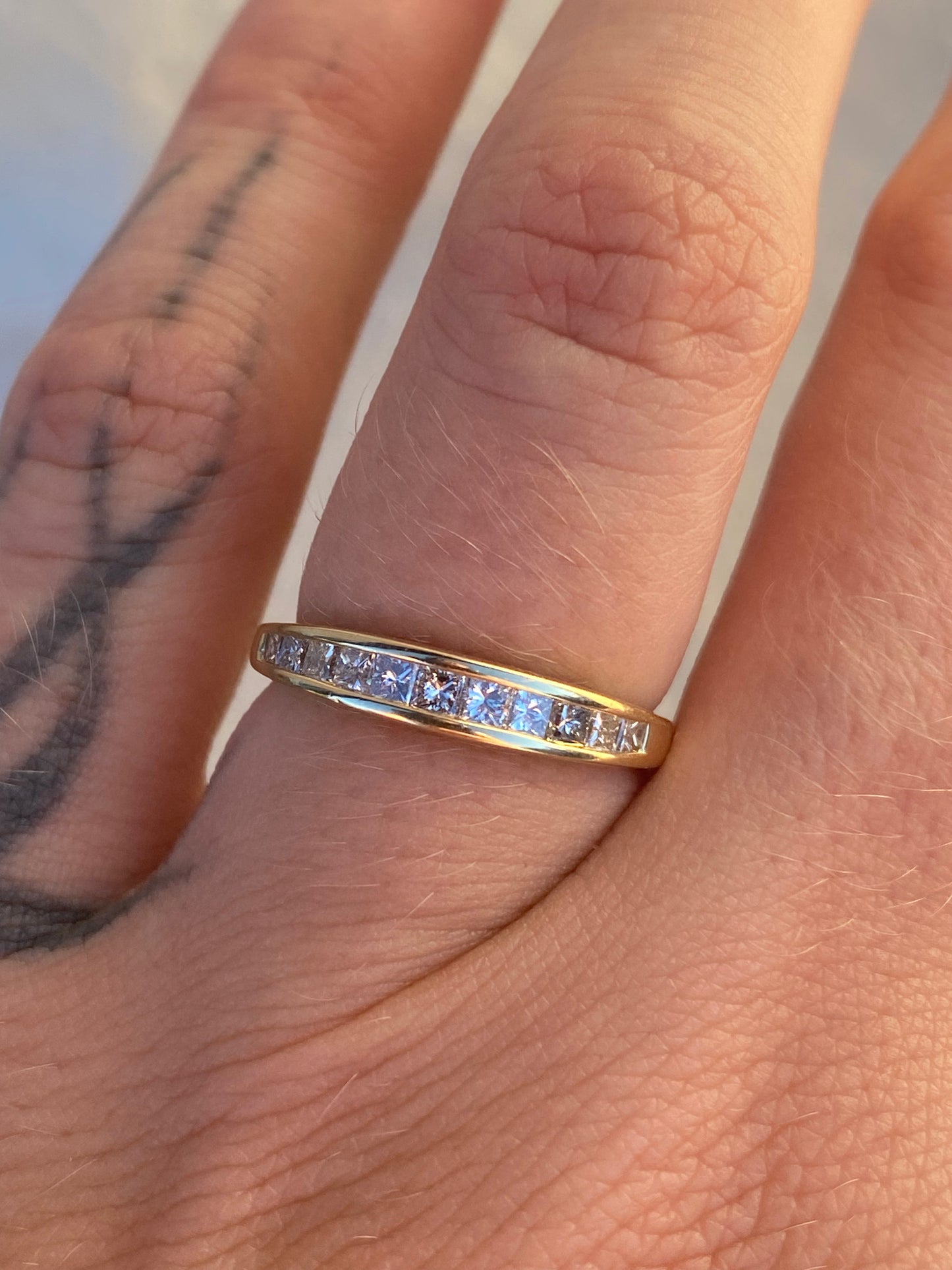 14kt channel set diamond band, thin