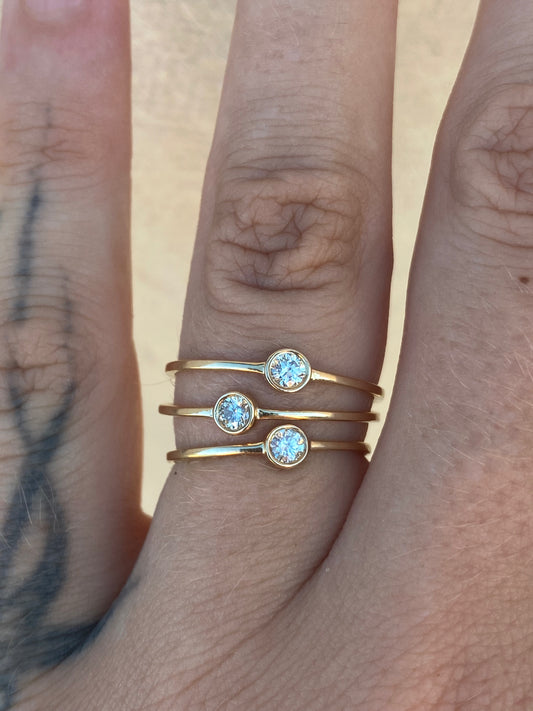 14kt .11ctw diamond bezel ring