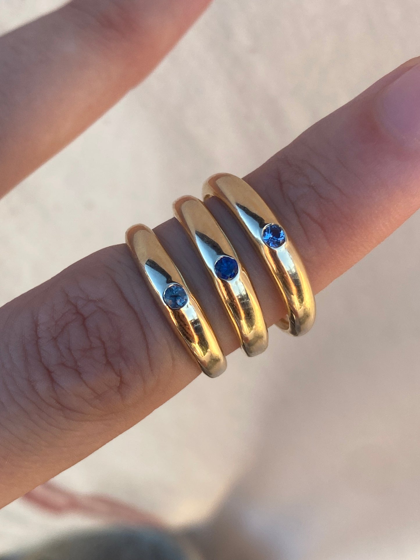 14kt flush set sapphire band