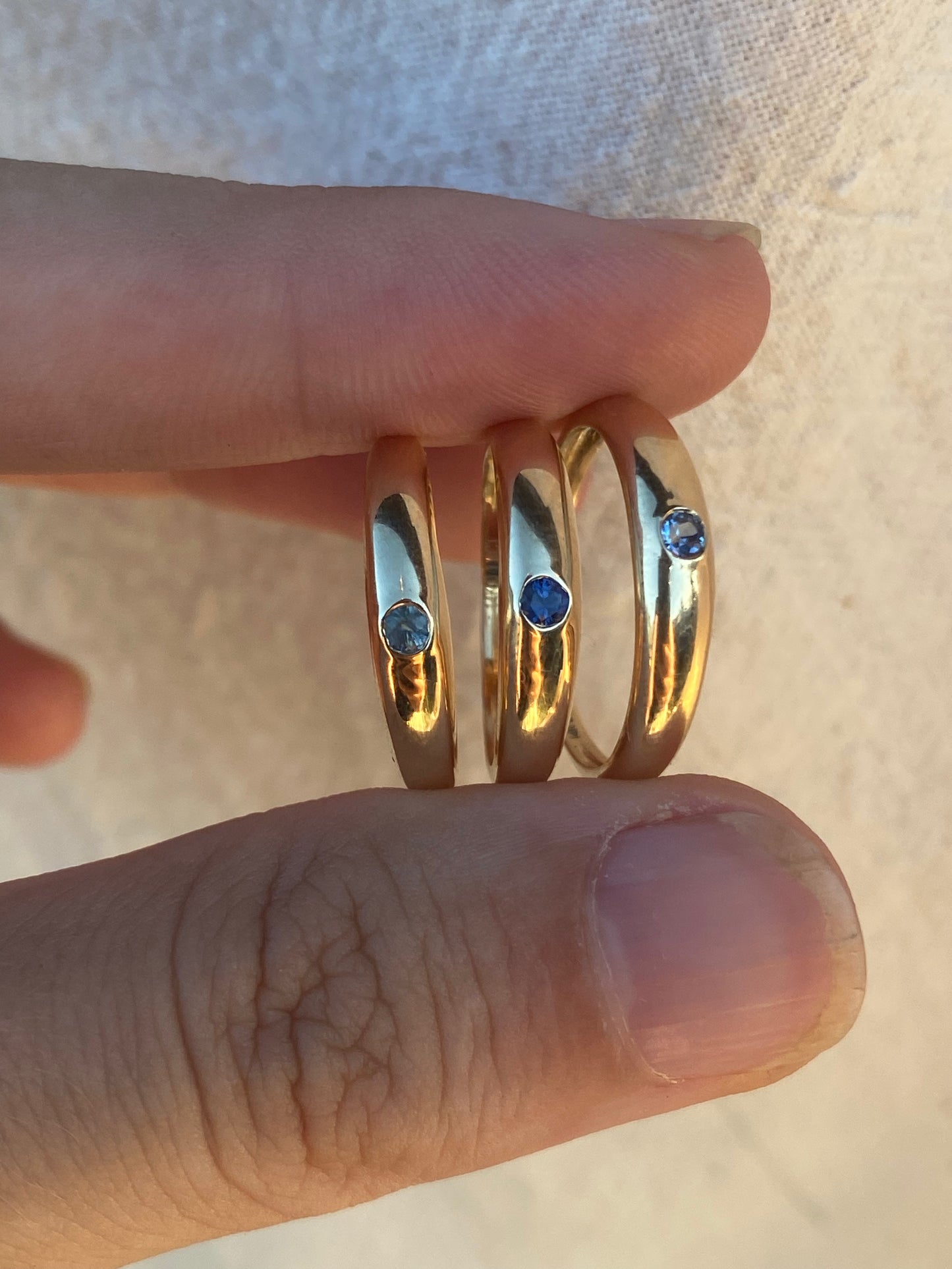 14kt flush set sapphire band